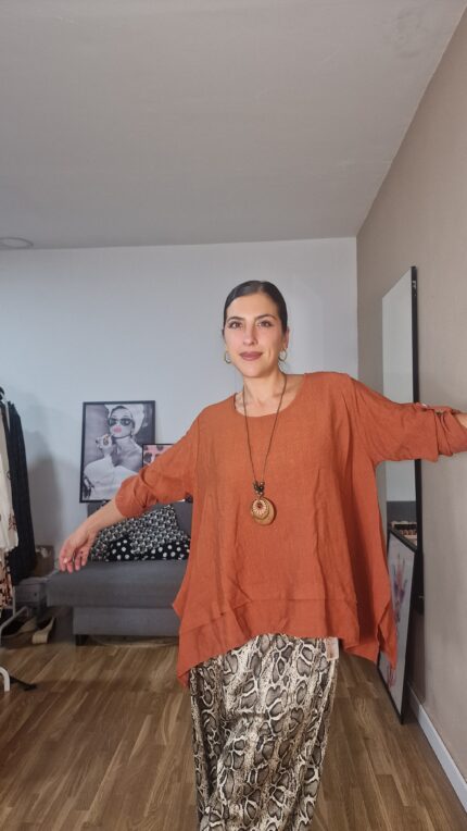 CAMISA SEMICURVI ASIMETRICA